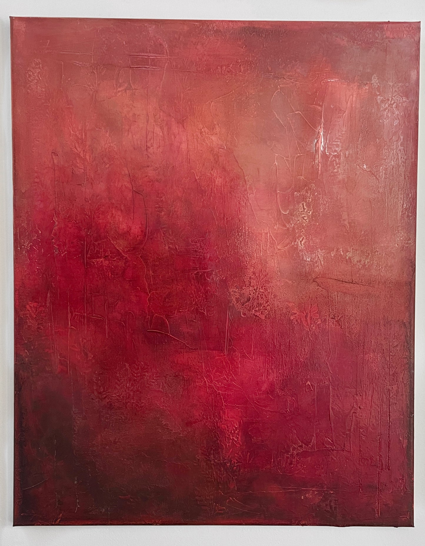 Abstract acrylic painting with textured matte finish in layered crimson and deep red tones, titled ‘Crimson Veil.’ Contemporary modern artwork with depth and warmth.