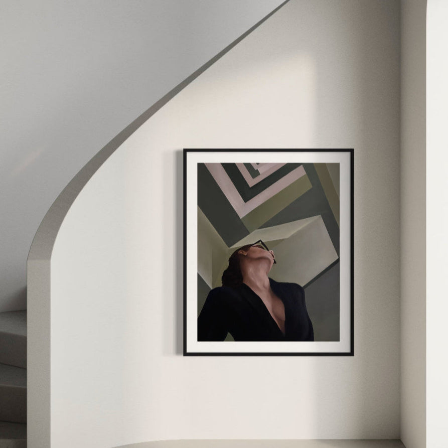 Framed abstract art on a wall in a modern interior setting